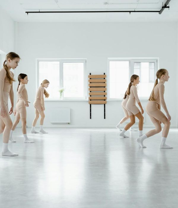 Person practicing active movement in a modern neon studio